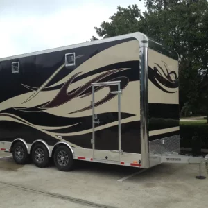 Black and Tan Trailer with Red Accent Design Outside
