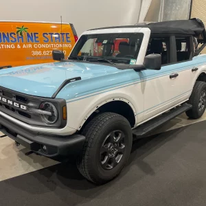 white and blue vehicle wrap for a jeep